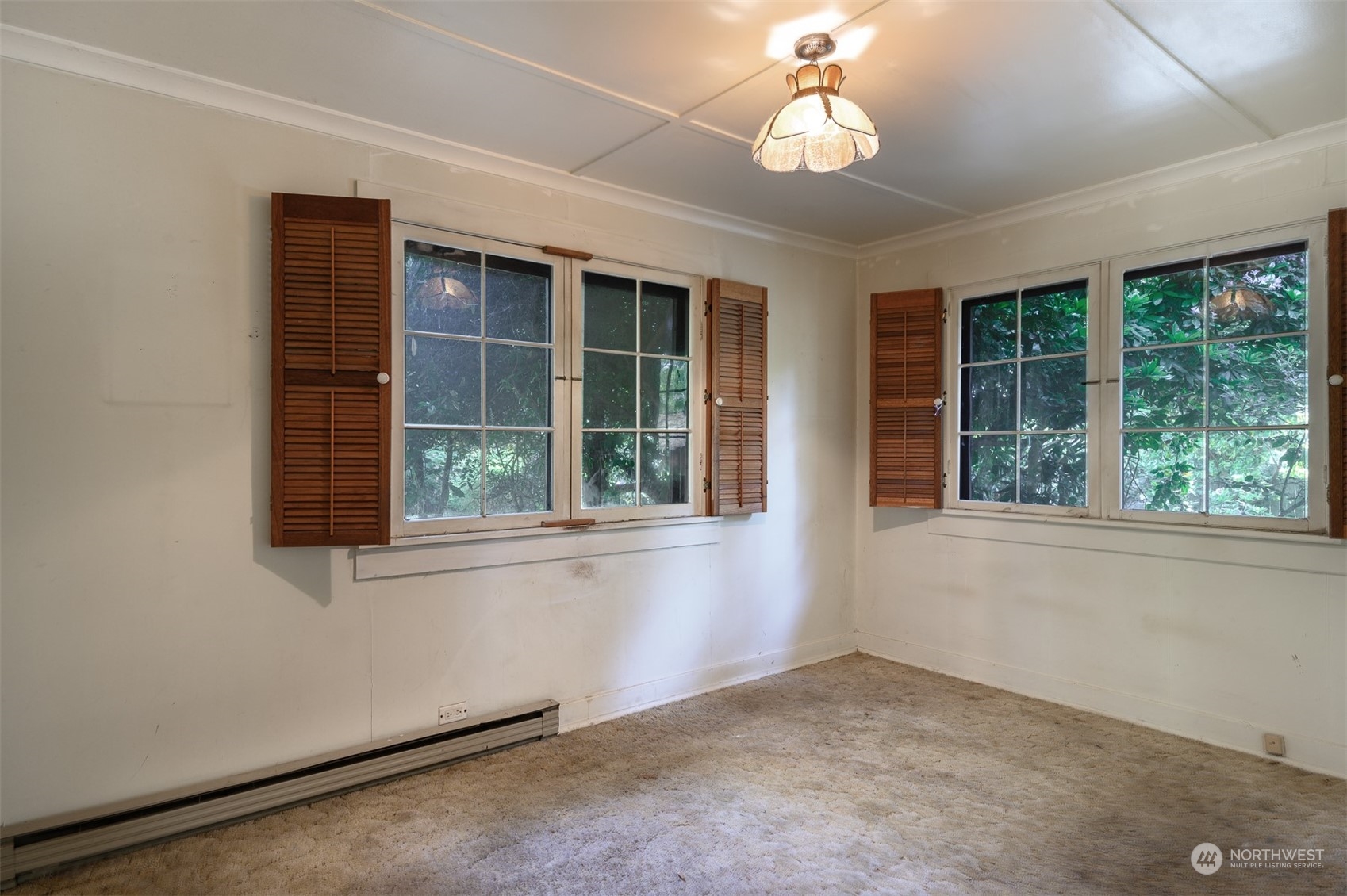 209 Southwest 132nd Street Burien, WA 98146 - Photo 18 of 27 a view of an empty room with a window