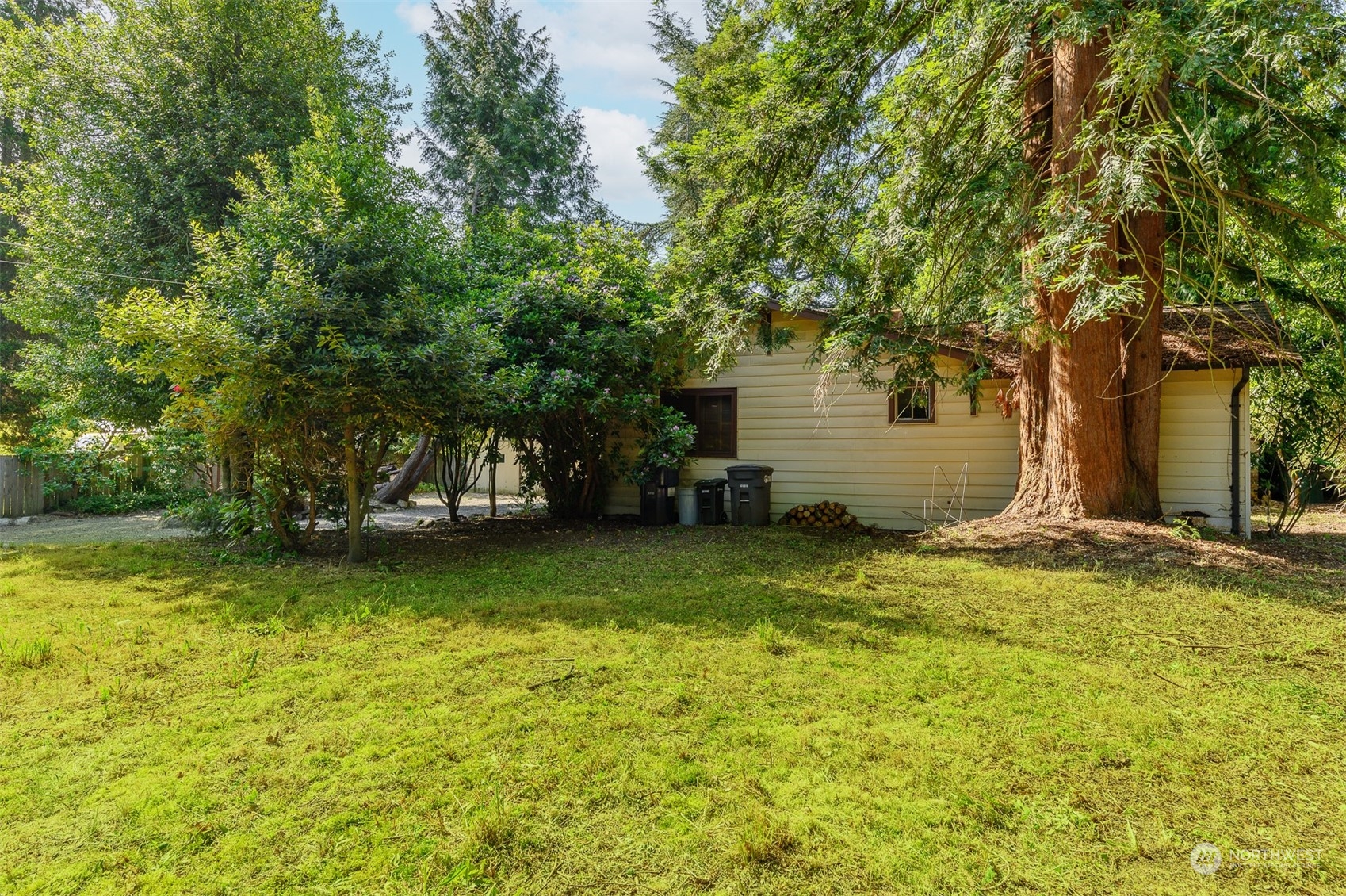 209 Southwest 132nd Street Burien, WA 98146 - Photo 8 of 27 a view of a backyard with swimming pool