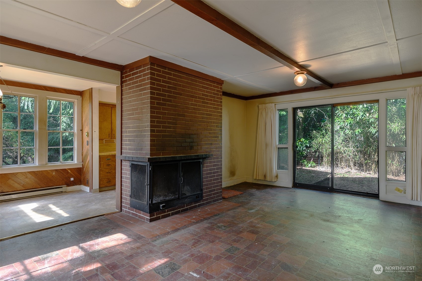 209 Southwest 132nd Street Burien, WA 98146 - Photo 10 of 27 a view of an empty room with windows