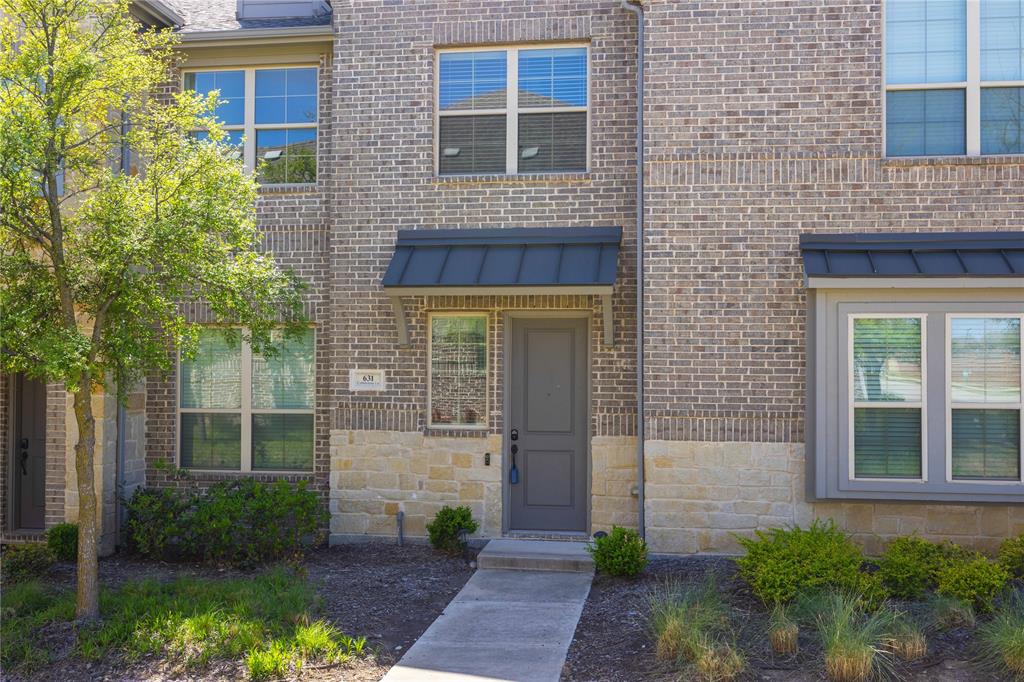 631 Cobblestone Lane Irving, TX 75039 - Photo 3 of 32 a front view of a house having yard