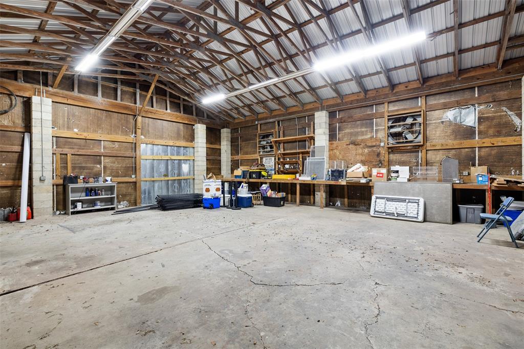 11311 Northeast 40th Street Road Silver Springs, FL 34488 - Photo 59 of 67 a view of a room with gym equipment