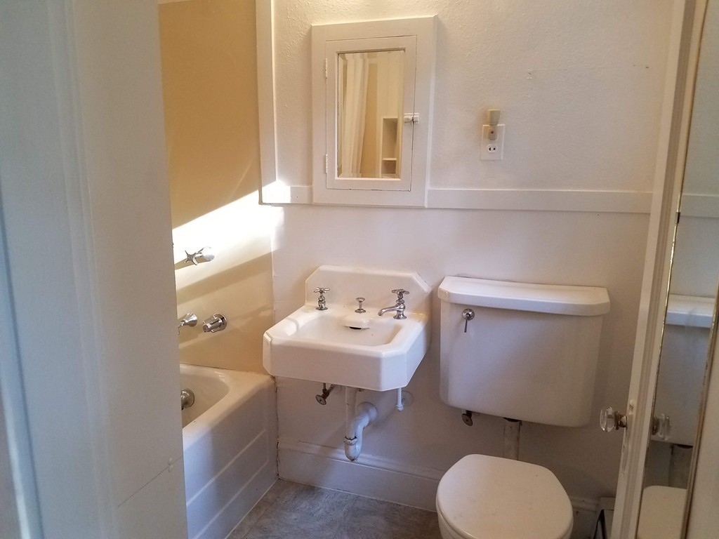 80 Eleanor Road Springfield, MA 01108 - Photo 25 of 30 a bathroom with a sink a toilet and bathtub