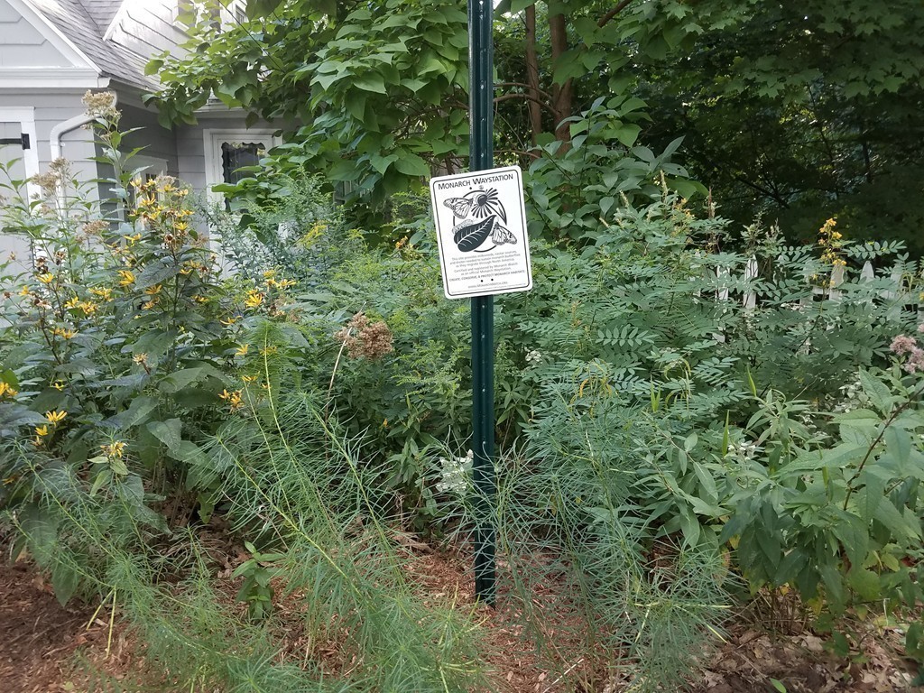 80 Eleanor Road Springfield, MA 01108 - Photo 30 of 30 a sign that is sitting in front of a red brick house