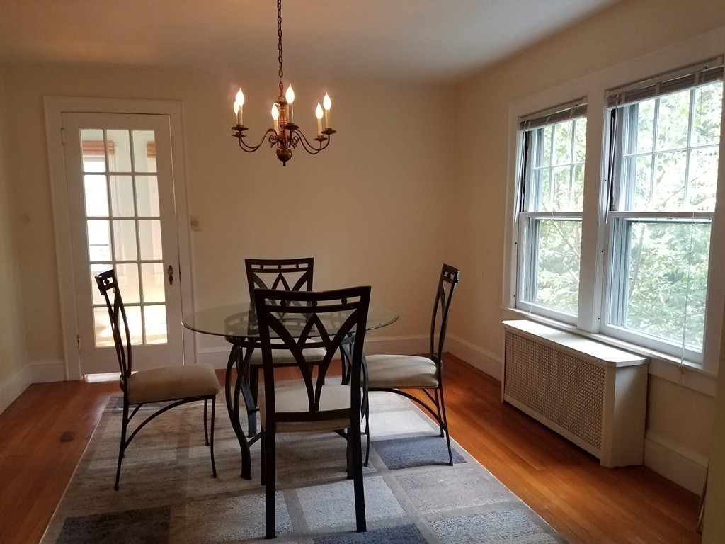80 Eleanor Road Springfield, MA 01108 - Photo 7 of 30 a view of a dining room with furniture window and wooden floor