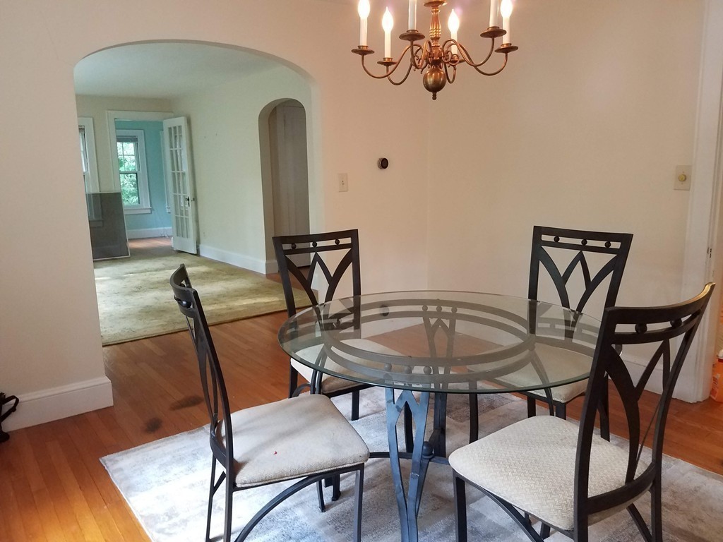 80 Eleanor Road Springfield, MA 01108 - Photo 8 of 30 a view of a dining room with furniture and wooden floor