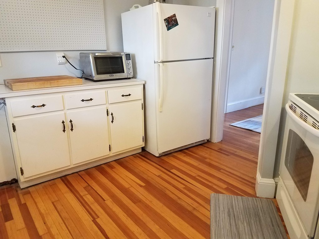 80 Eleanor Road Springfield, MA 01108 - Photo 10 of 30 a view of a kitchen with wooden floor and electronic appliances