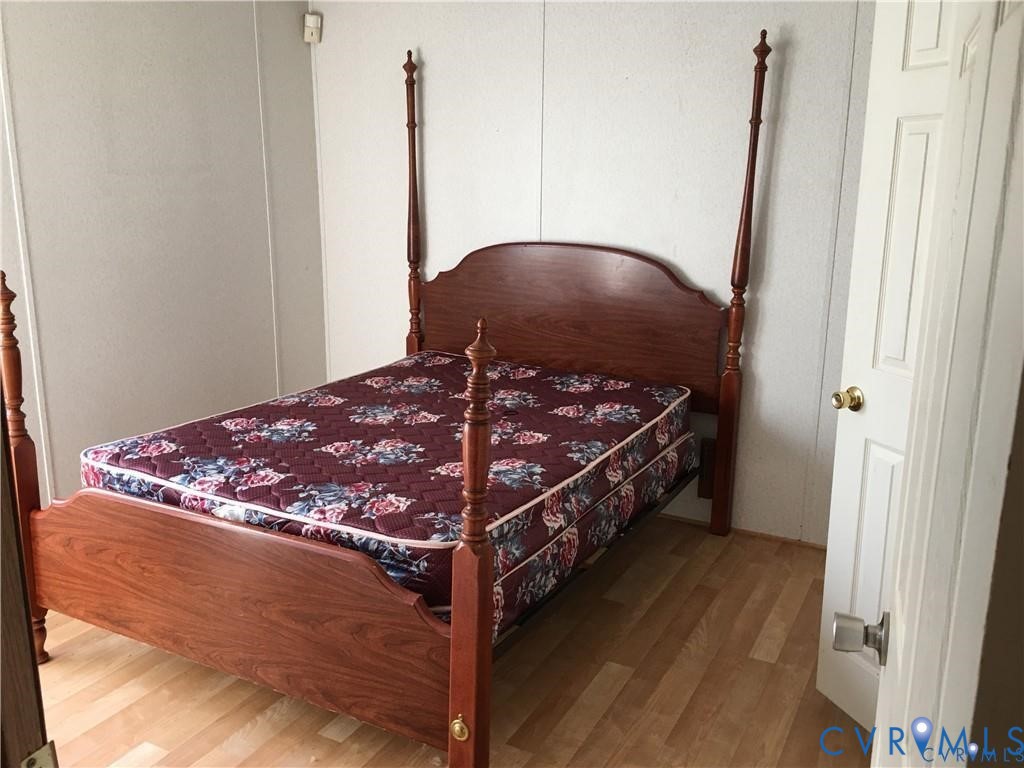 12232 Darbys Road Doswell, VA 23047 - Photo 7 of 17 Bedroom featuring light wood-type flooring