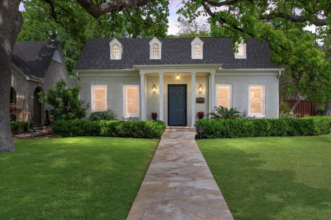 1500 Westover Road Austin, TX 78703 - Photo 1 of 1 a front view of a house with a yard
