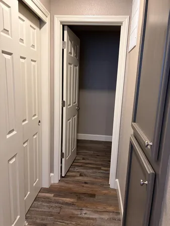 a view of a house with a small backyard