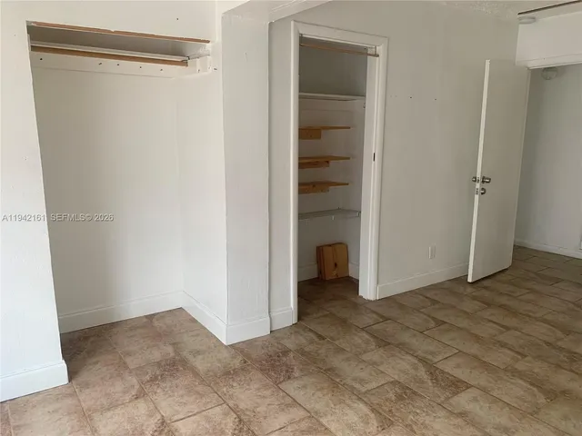 a view of a room with an empty space