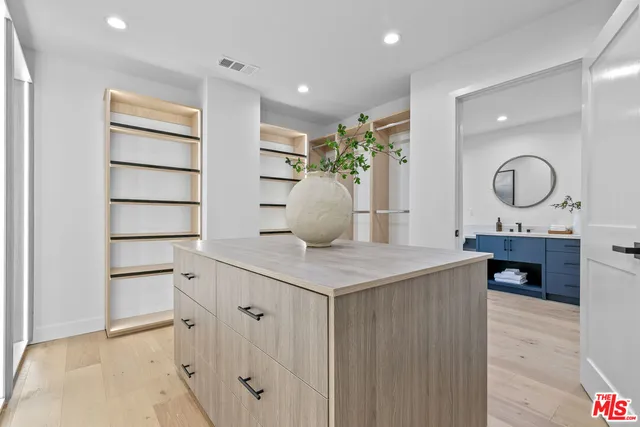 a view of a swimming pool with a yard and mountain view
