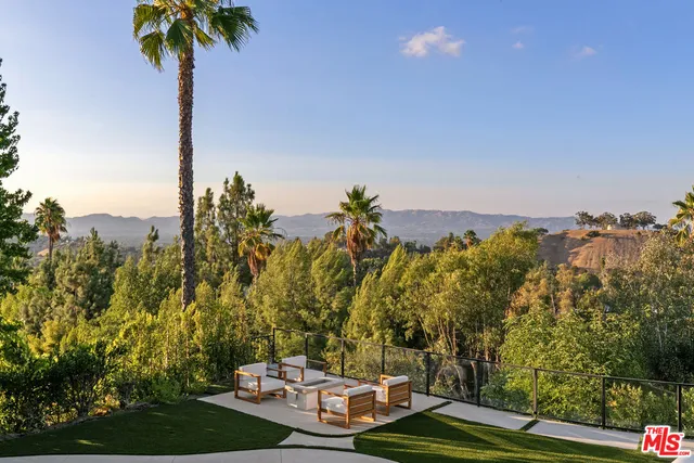 an aerial view of a house with garden