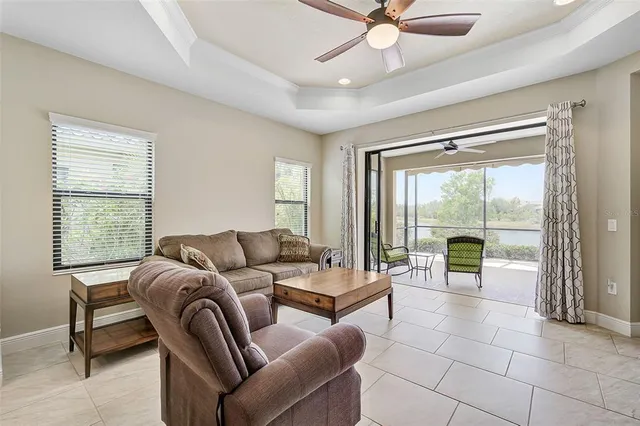 a bed room with a bed and a chandelier