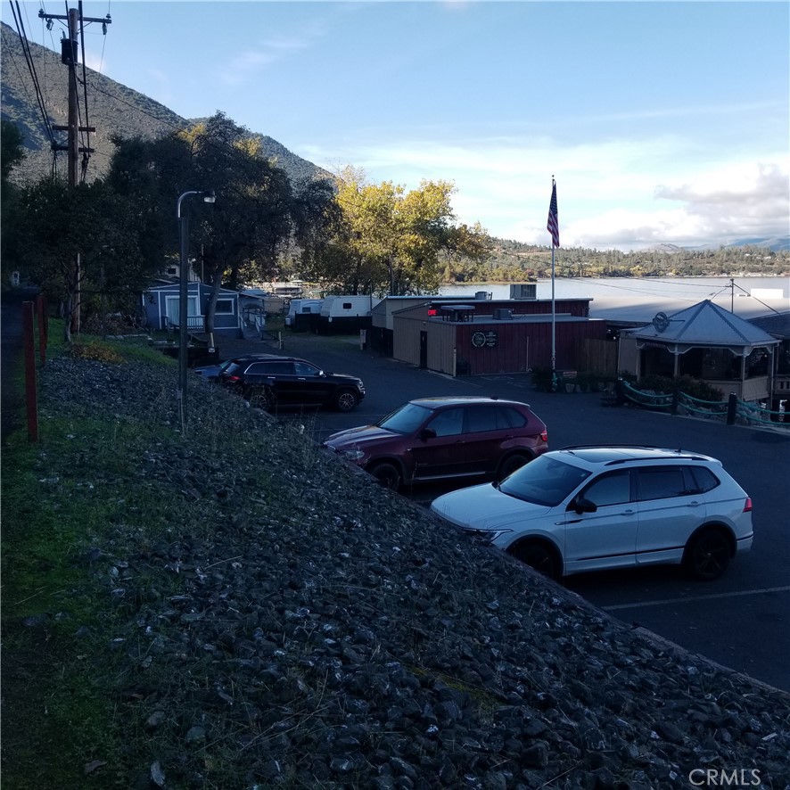 9435 Konocti Bay Road Kelseyville, CA 95451 - Photo 11 of 12 a couple of cars parked in a yard