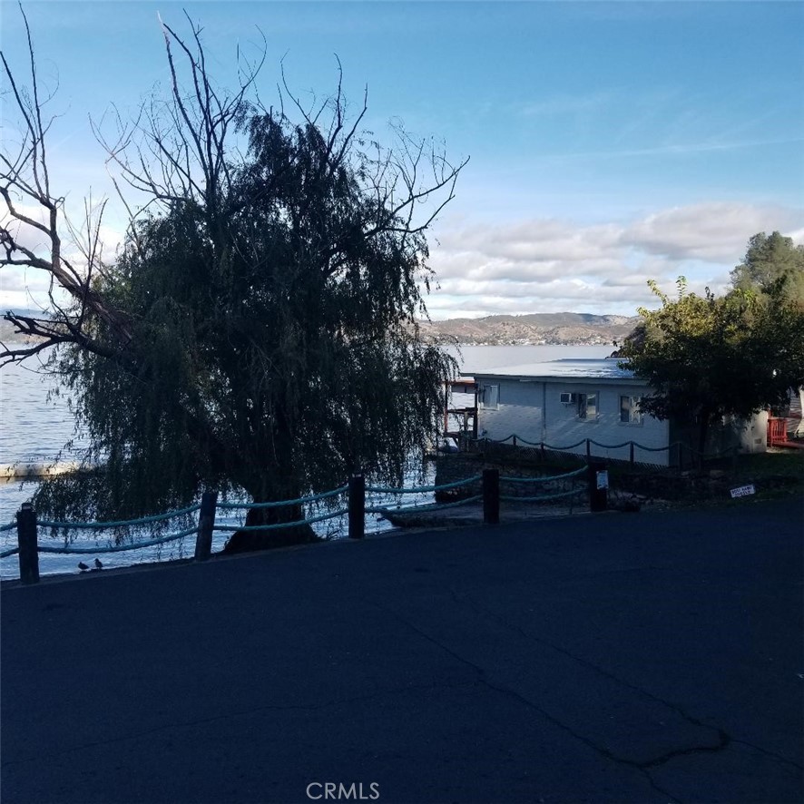 9435 Konocti Bay Road Kelseyville, CA 95451 - Photo 7 of 12 a view of a street with some trees