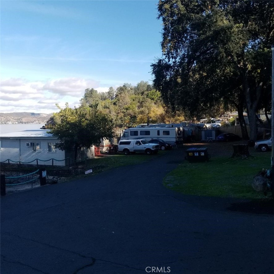 9435 Konocti Bay Road Kelseyville, CA 95451 - Photo 9 of 12 a front view of a house with a yard
