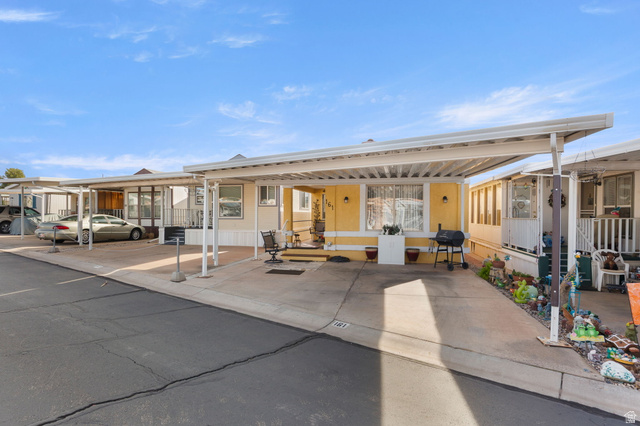 1225 North Dixie Downs Road, Unit 161 St. George, UT 84770 - Photo 21 of 21 Yellow exterior with white trim