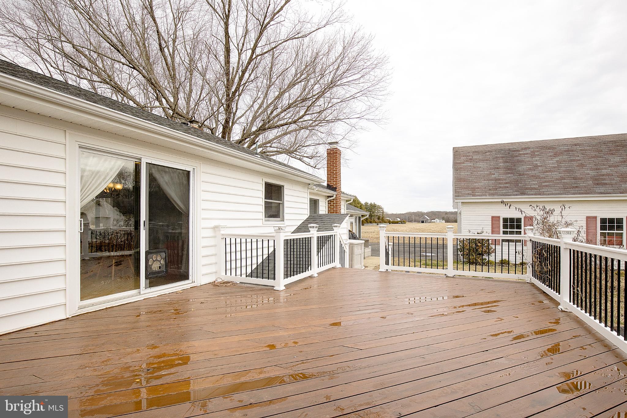3406 Horn Road Huntingtown, MD 20639 - Photo 43 of 74 Spacious deck with serene outdoor views.