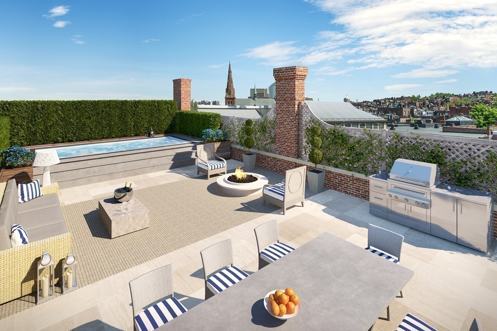 89 Beacon Street, Unit PH Boston, MA 02108 - Photo 13 of 22 a view of a terrace with furniture and a table