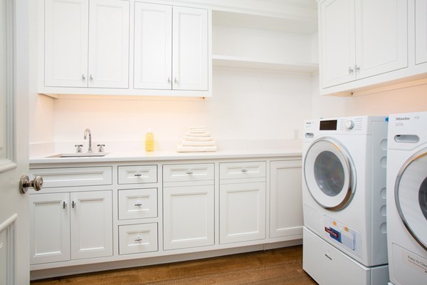 89 Beacon Street, Unit PH Boston, MA 02108 - Photo 14 of 22 a kitchen with white cabinets and sink