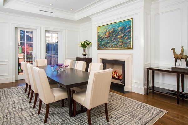 89 Beacon Street, Unit PH Boston, MA 02108 - Photo 6 of 22 a view of a livingroom with furniture and a fireplace