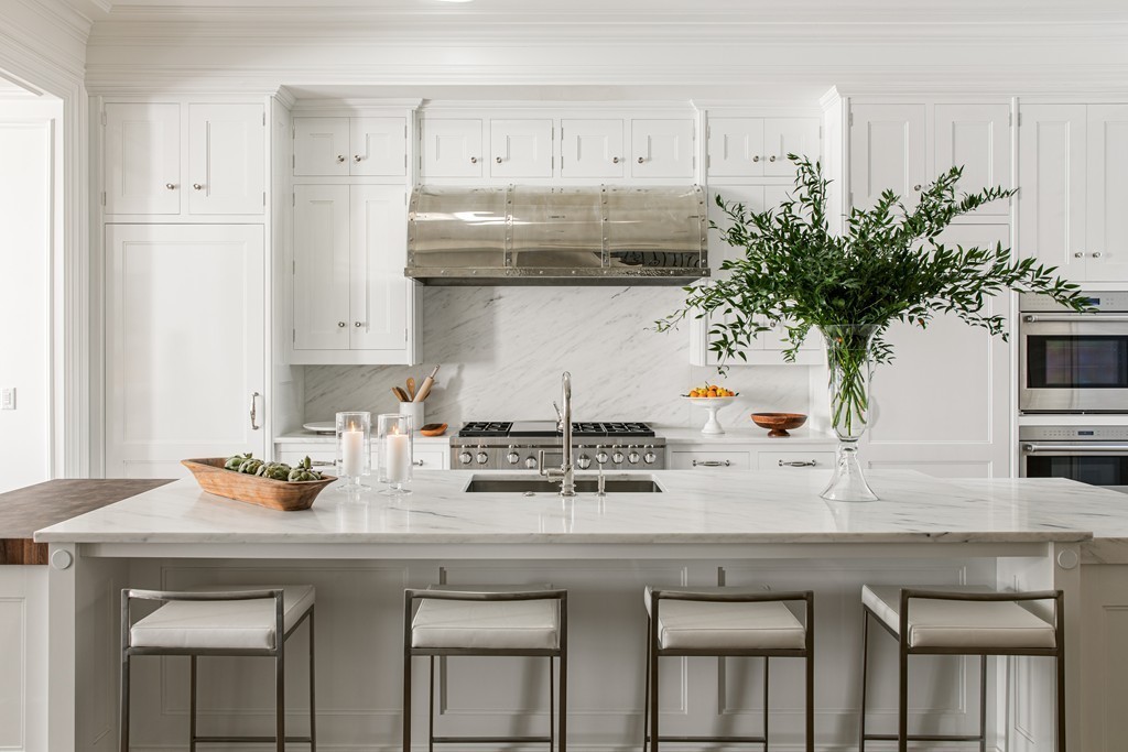 89 Beacon Street, Unit PH Boston, MA 02108 - Photo 8 of 22 a kitchen with stainless steel appliances a sink and cabinets