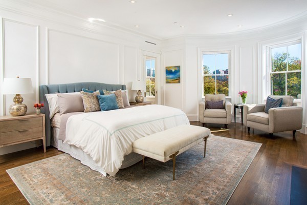 89 Beacon Street, Unit PH Boston, MA 02108 - Photo 9 of 22 a bedroom with a bed and wooden floor