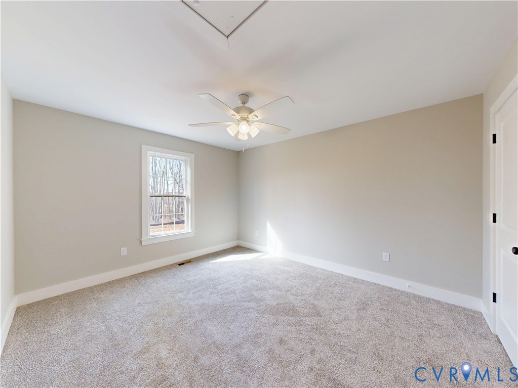 15085 Lebanon Road Spring Grove, VA 23881 - Photo 12 of 16 a view of an empty room with a window