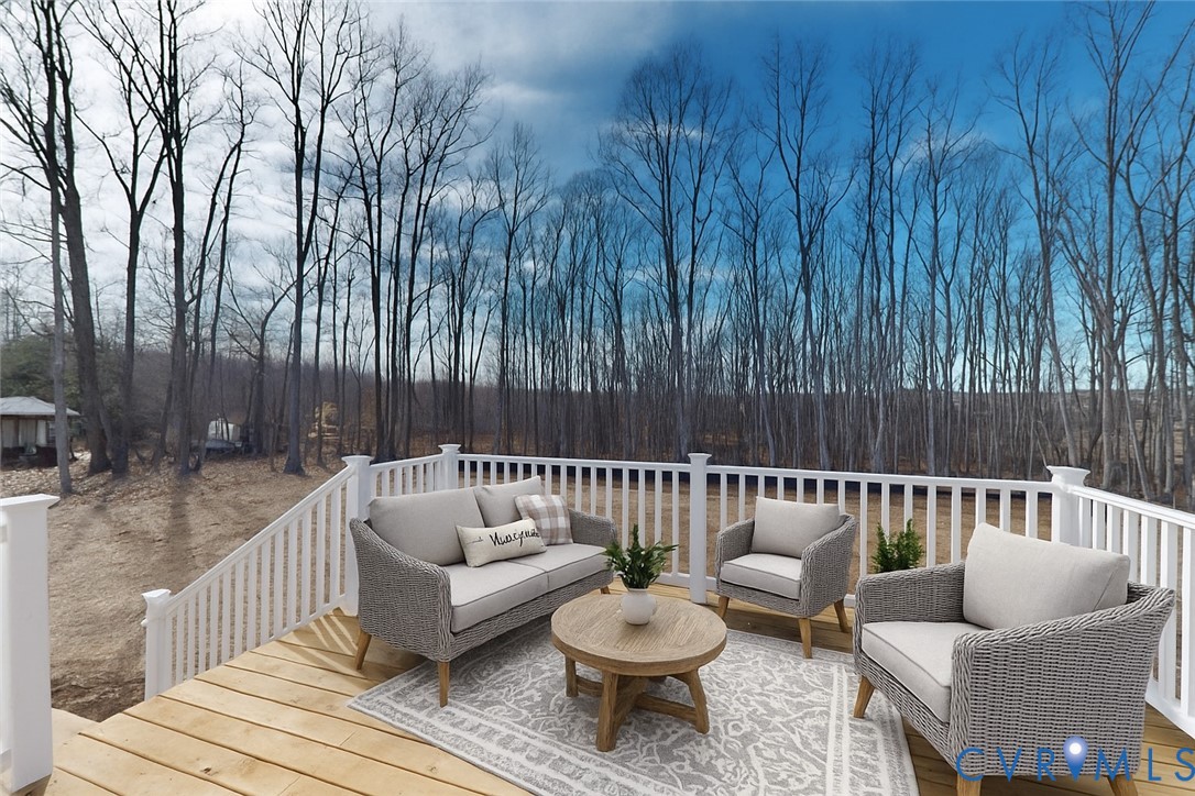 15085 Lebanon Road Spring Grove, VA 23881 - Photo 14 of 16 a view of sitting area with furniture and wooden fence