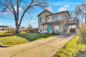 2947 Moss Street Austin, TX 78722 - Photo 2 of 15 View of front of home featuring driveway