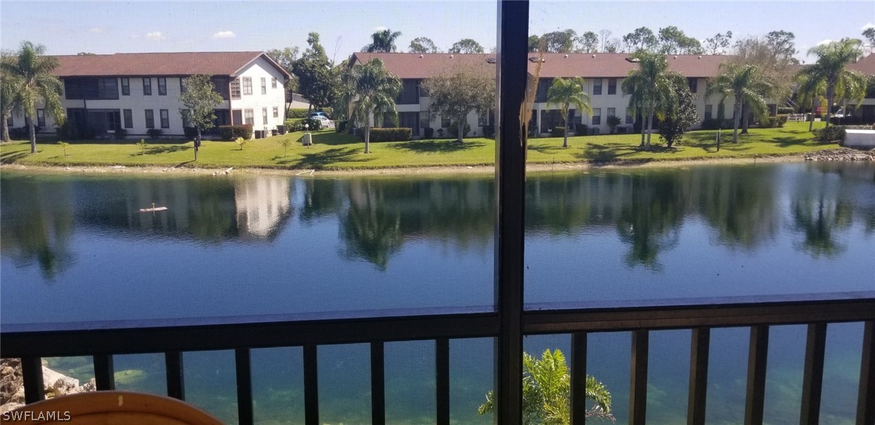 5277 Treetops Drive, Unit W204 Naples, FL 34113 - Photo 1 of 19 a view of swimming pool from a balcony
