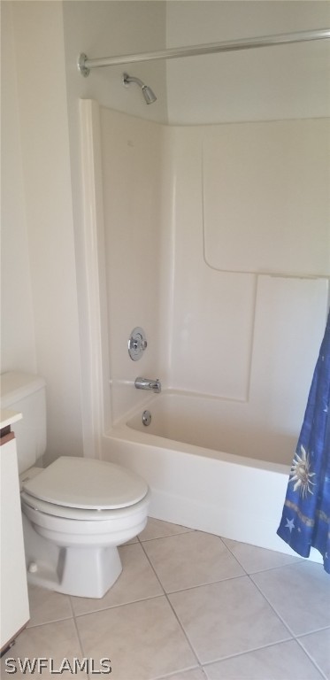 5277 Treetops Drive, Unit W204 Naples, FL 34113 - Photo 15 of 19 a white toilet sitting next to a bath tub