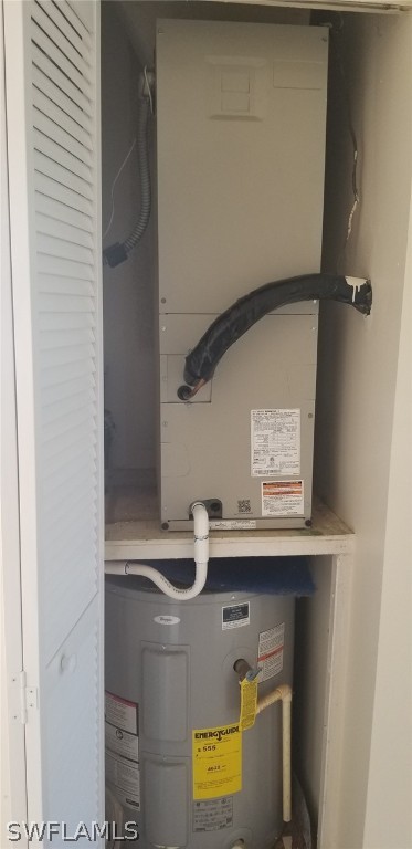 5277 Treetops Drive, Unit W204 Naples, FL 34113 - Photo 17 of 19 a view of storage and utility room