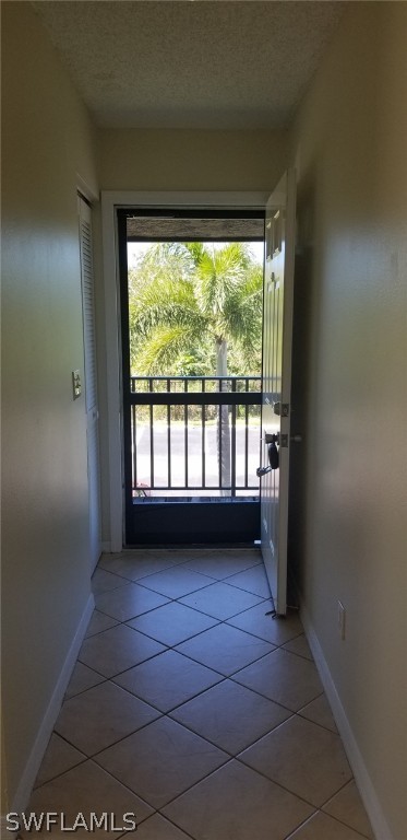 5277 Treetops Drive, Unit W204 Naples, FL 34113 - Photo 3 of 19 a view of a room with a large window