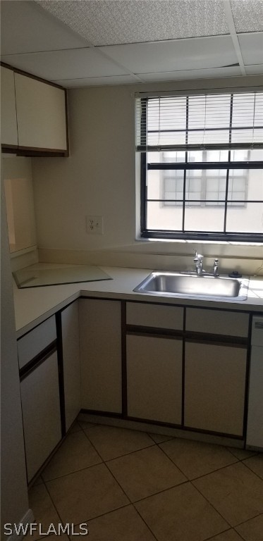 5277 Treetops Drive, Unit W204 Naples, FL 34113 - Photo 6 of 19 a kitchen with a stove and a microwave