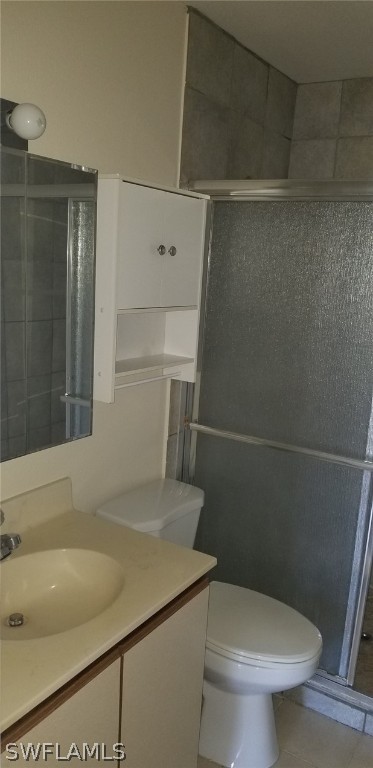5277 Treetops Drive, Unit W204 Naples, FL 34113 - Photo 7 of 19 a bathroom with a sink and toilet