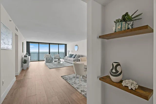 a view of a livingroom with furniture and wooden floor