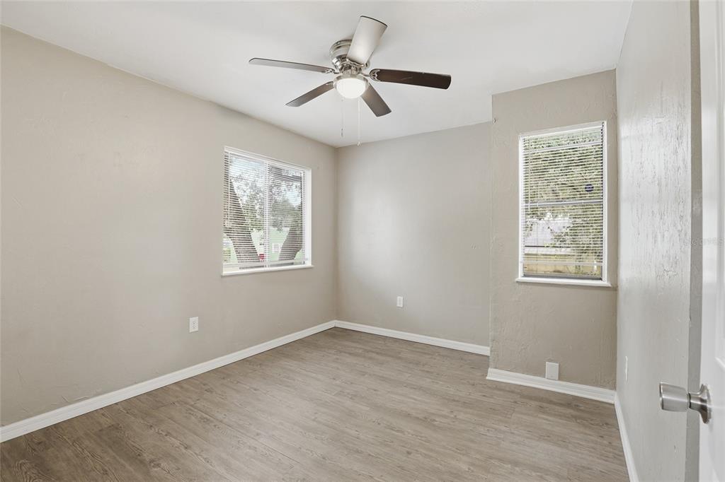 207 Southwest 6th Avenue Gainesville, FL 32601 - Photo 17 of 24 a view of an empty room with a window