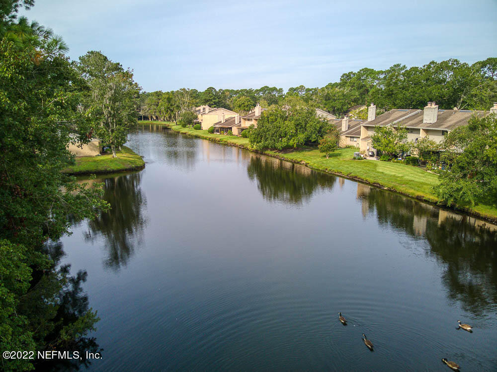 3801 Crown Point Road, Unit 3082 Jacksonville, FL 32257 - Photo 12 of 23 a view of a lake with houses in outdoor space