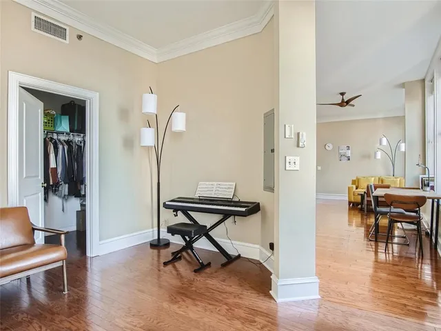 a view of a livingroom with furniture and wooden floor