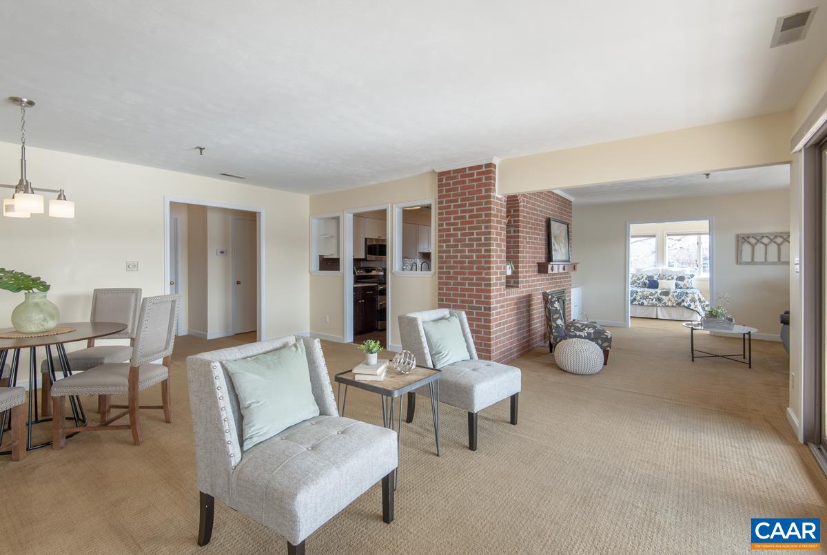 4 Marina Point Palmyra, VA 22963 - Photo 12 of 51 a living room with furniture and a table