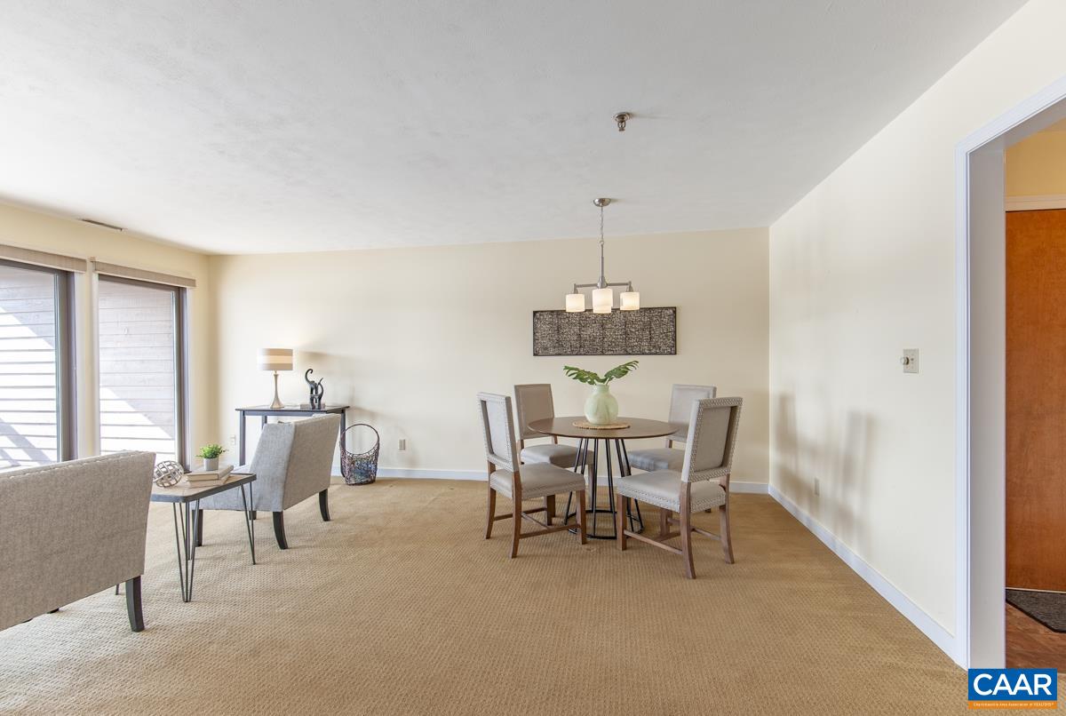 4 Marina Point Palmyra, VA 22963 - Photo 14 of 51 a view of a dining room with furniture and chandelier