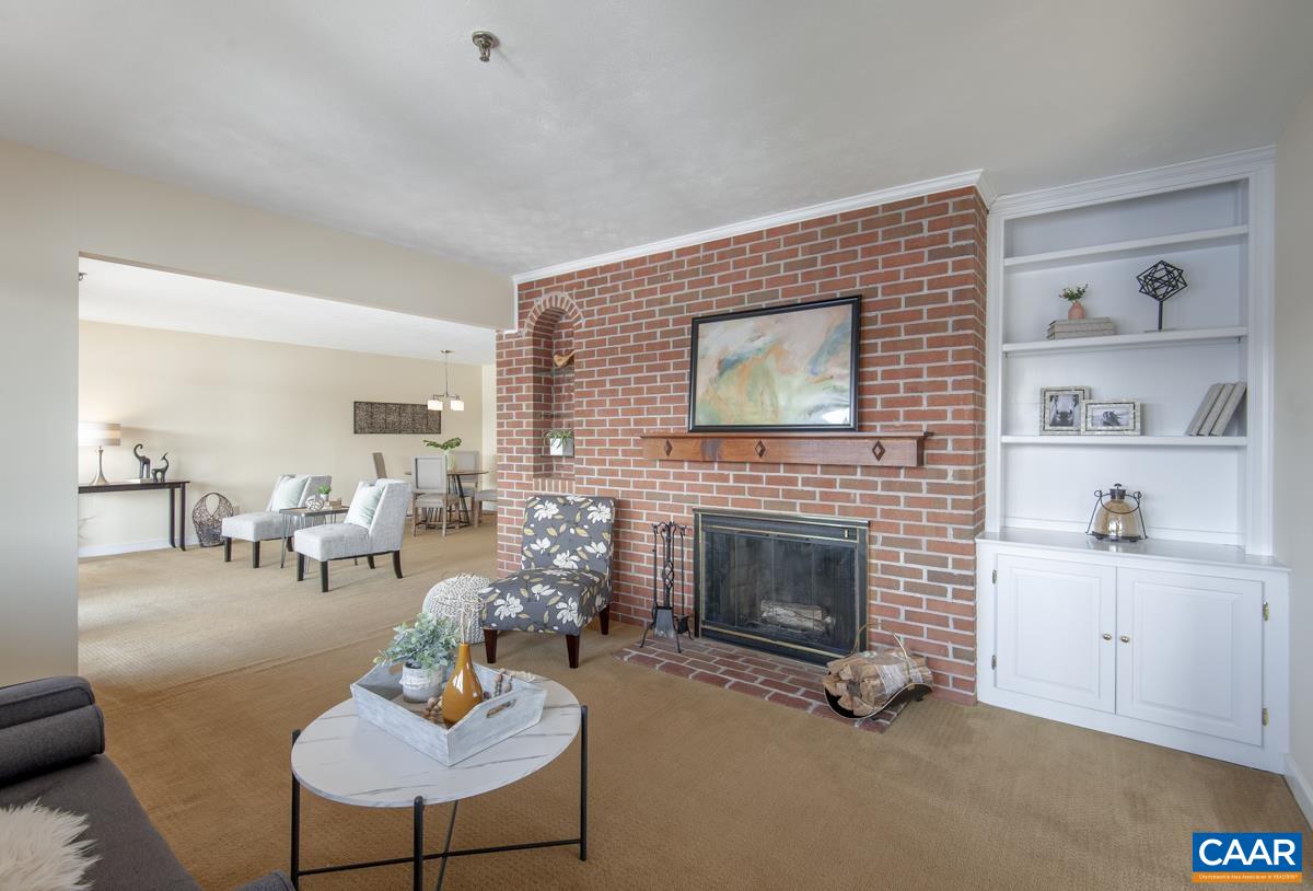 4 Marina Point Palmyra, VA 22963 - Photo 16 of 51 a living room with furniture and a fireplace