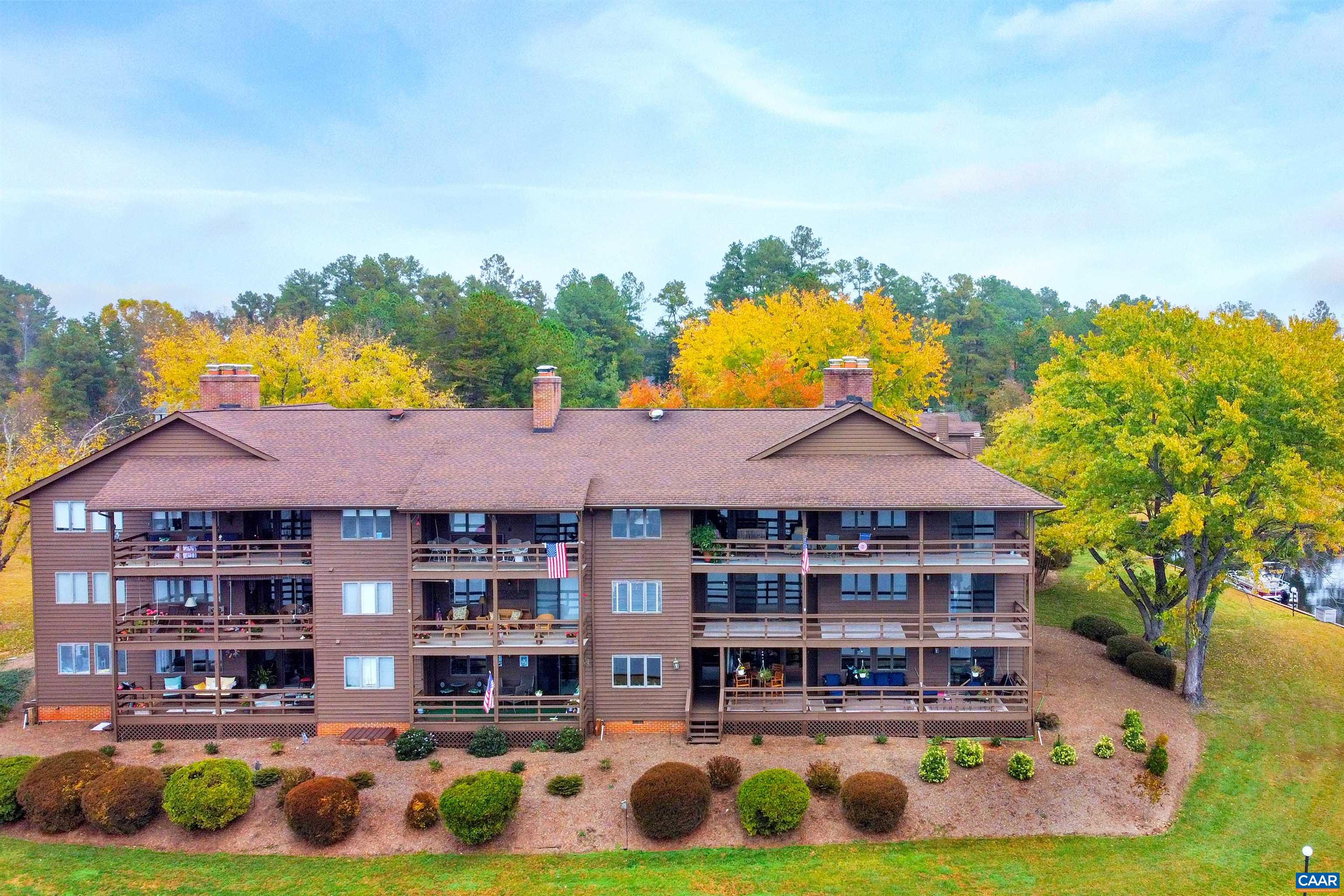 4 Marina Point Palmyra, VA 22963 - Photo 49 of 51 a view of an apartment with a garden and swimming pool