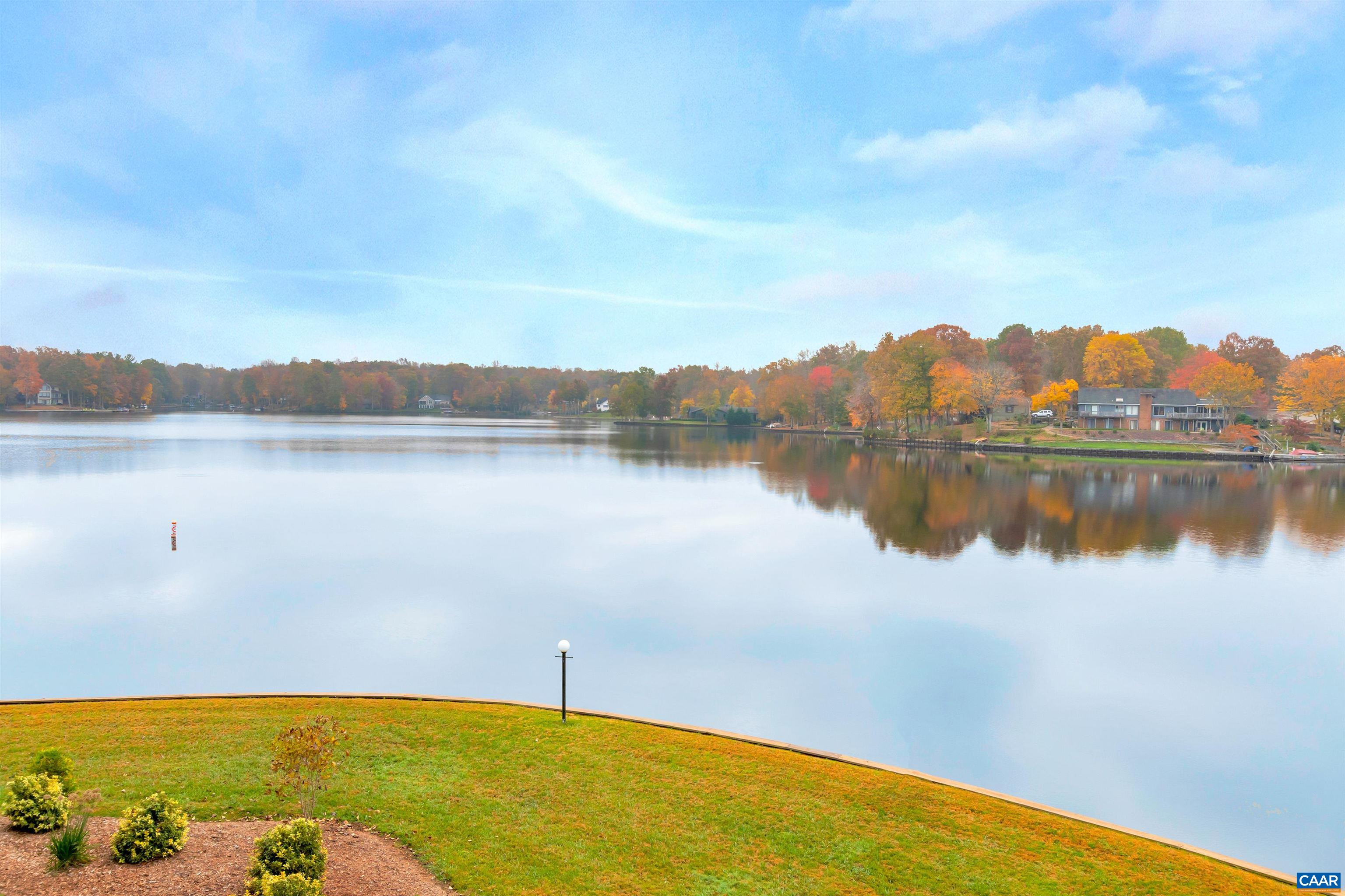 4 Marina Point Palmyra, VA 22963 - Photo 8 of 51 a view of a lake with houses in the back