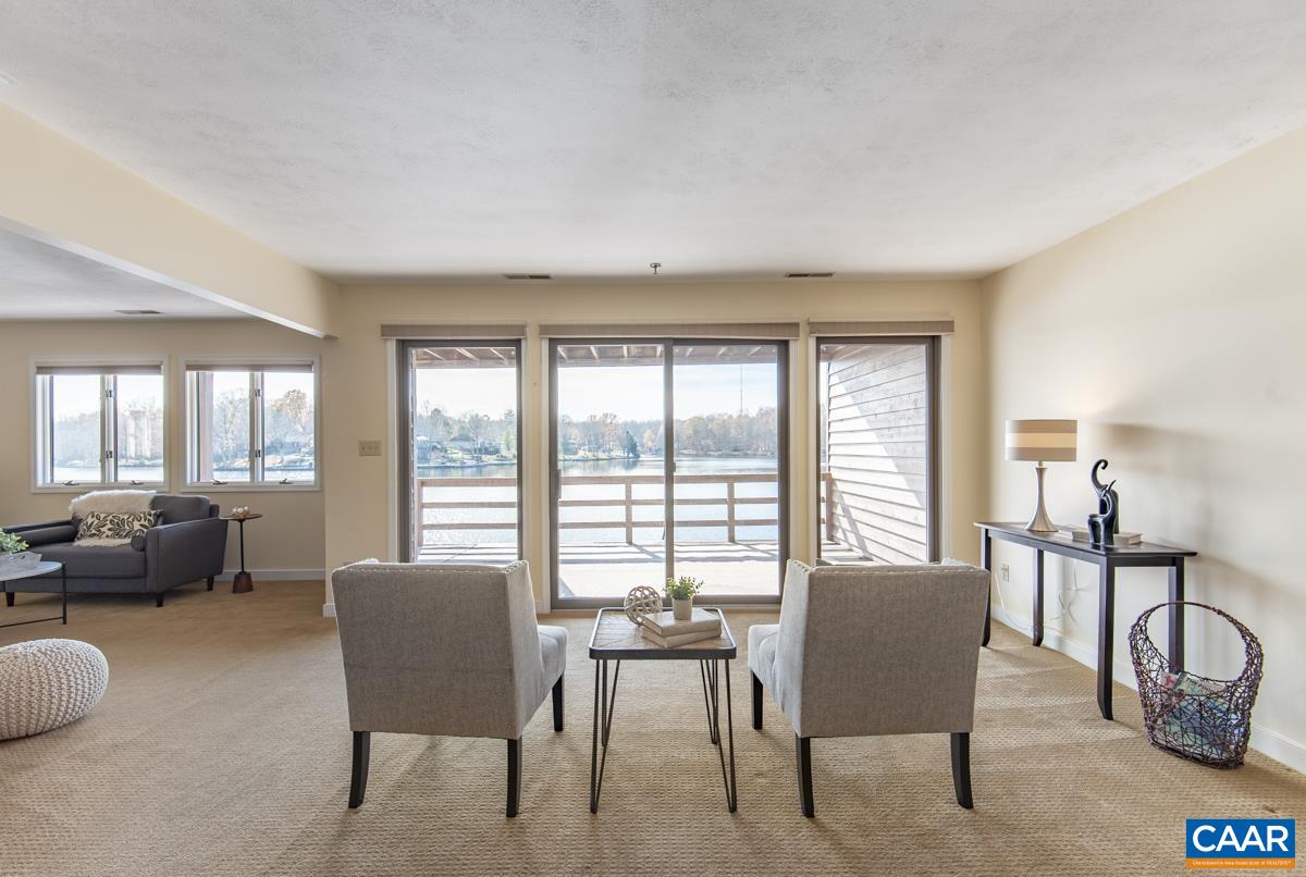 4 Marina Point Palmyra, VA 22963 - Photo 10 of 51 a living room with furniture and a large window