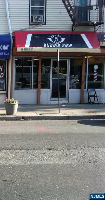 a view of a building with sitting area