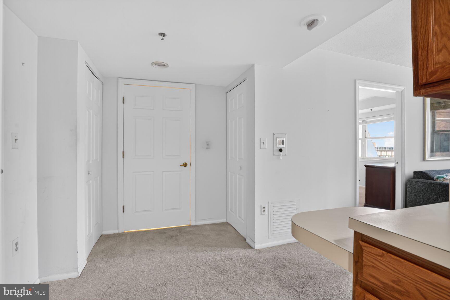 900 North Taylor Street, Unit 909 Arlington, VA 22203 - Photo 6 of 42 a view of kitchen with furniture and window