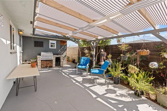 a view of a garage with an outdoor space