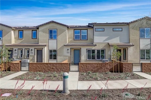 a front view of a house with entertaining space